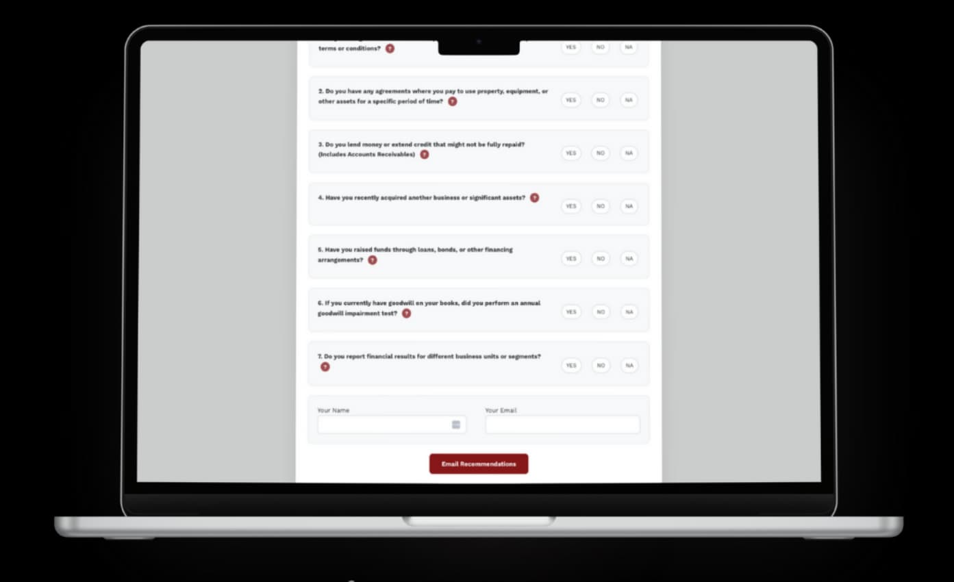 Laptop displaying an online financial or business questionnaire form