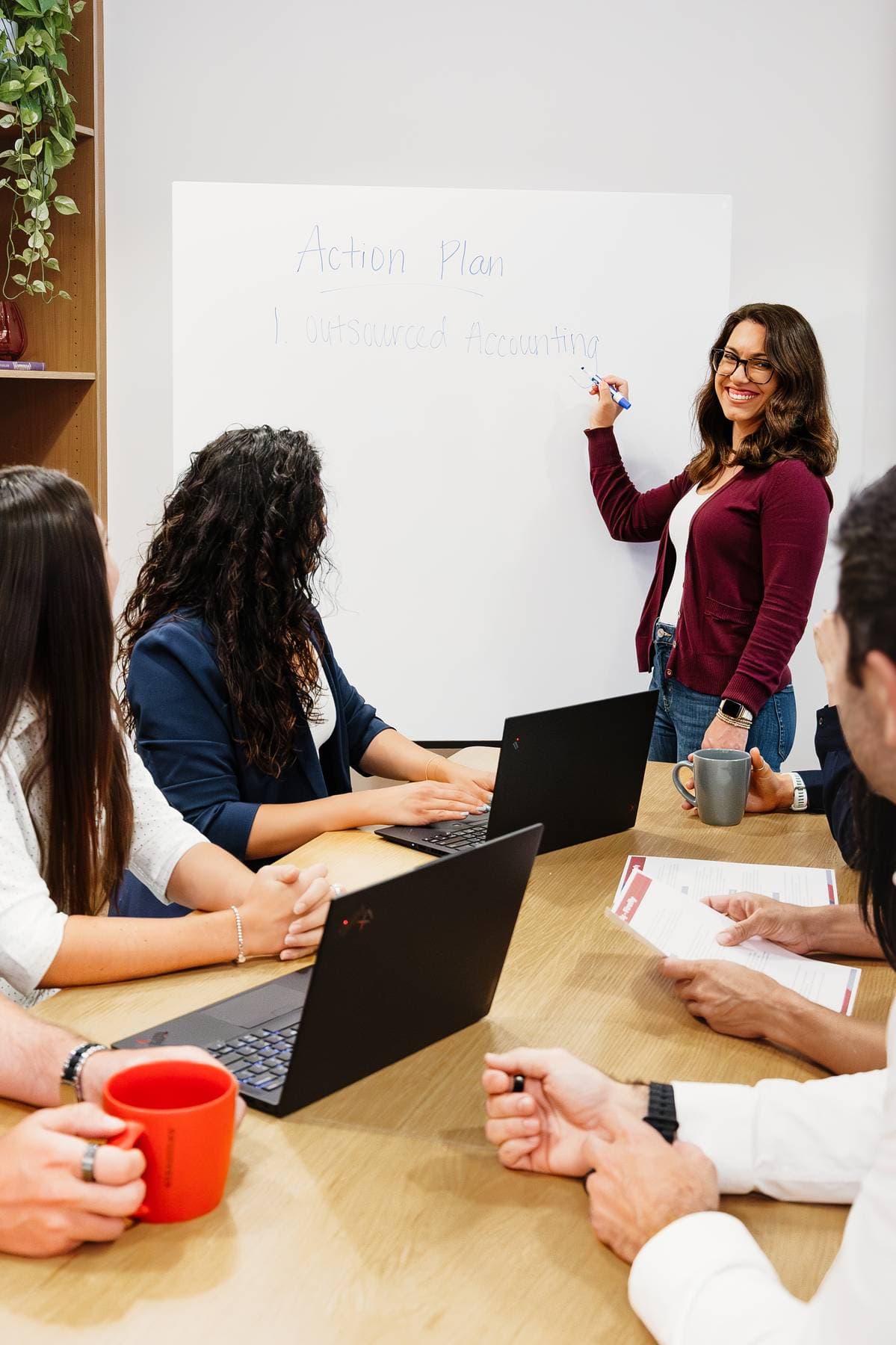 Danielle presenting an action plan to the Zeroed-In team